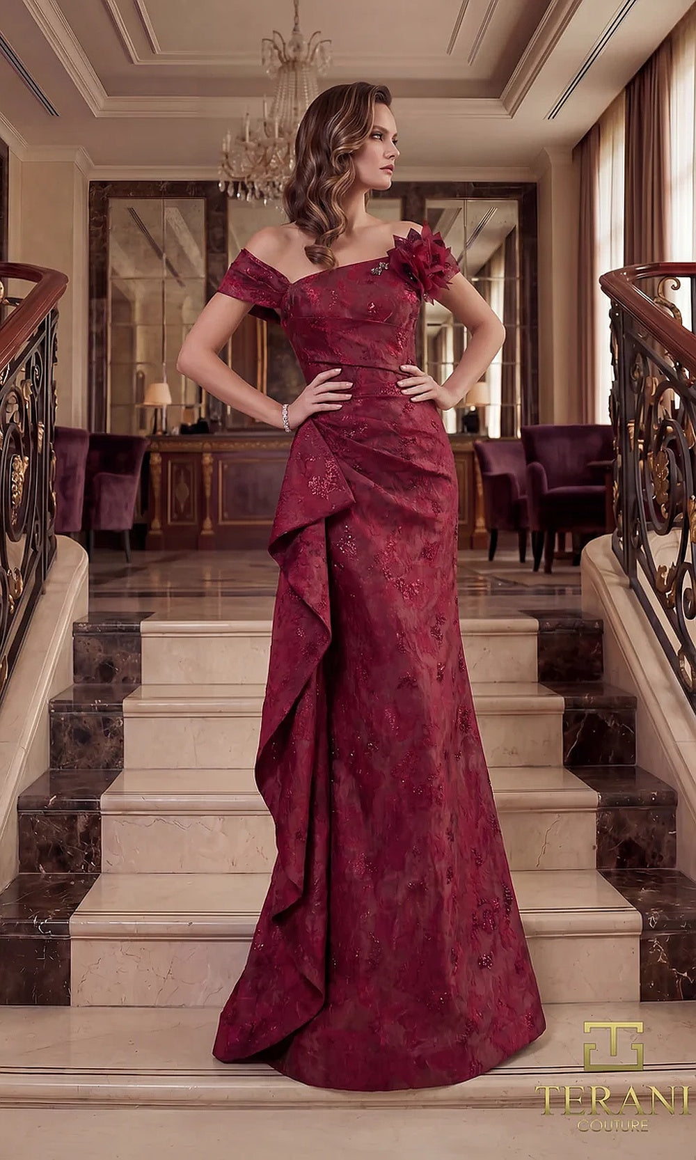 Terani Couture 262M7298 Merlot mother of the bride dress front view with off-shoulder folded neckline with rosette, draped brocade fitted mermaid with side cascade, mother of the bride styling