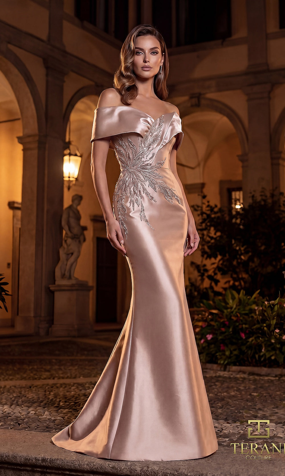 Terani Couture 262M7517 Latte mother of the bride dress front view with off-shoulder folded neckline with crystal beaded burst, satin fitted mermaid, mother of the bride styling