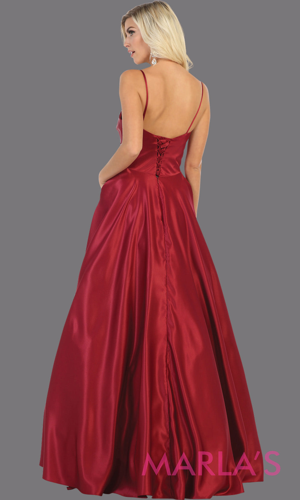 Back of Long simple v neck burgundy red satin semi ballgown with pockets. This dark red flowy gown from mayqueen is perfect for prom, black tie event, engagement dress, formal party dress, plus size wedding guest dresses, indowestern party dress