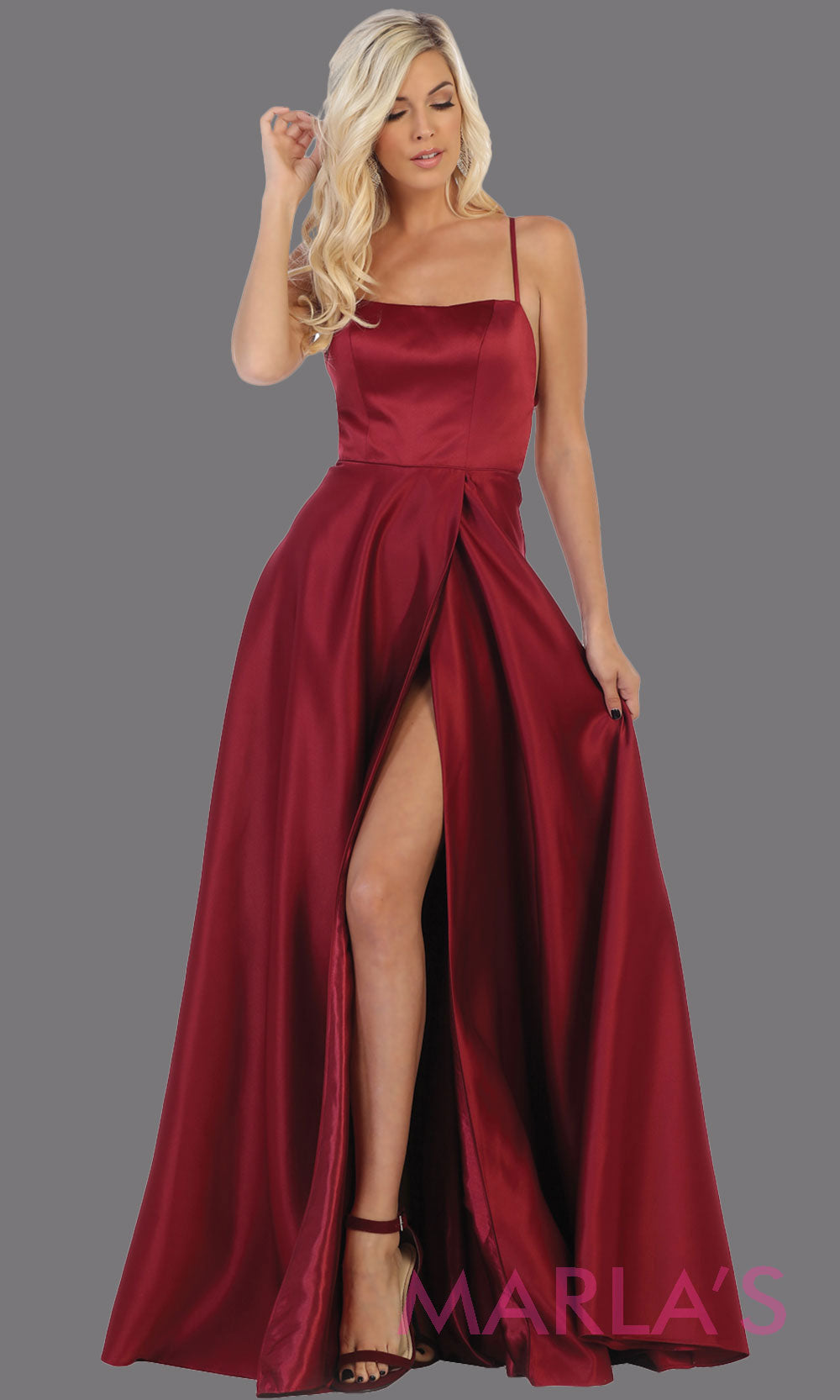 Long burgundy satin corset back dress with high slit from MayQueen RQ7711. This dark red prom evening gown is perfect for wedding guest dress, formal party dress, plus size dresses, engagement party, e shoot, engagement shoot, gala