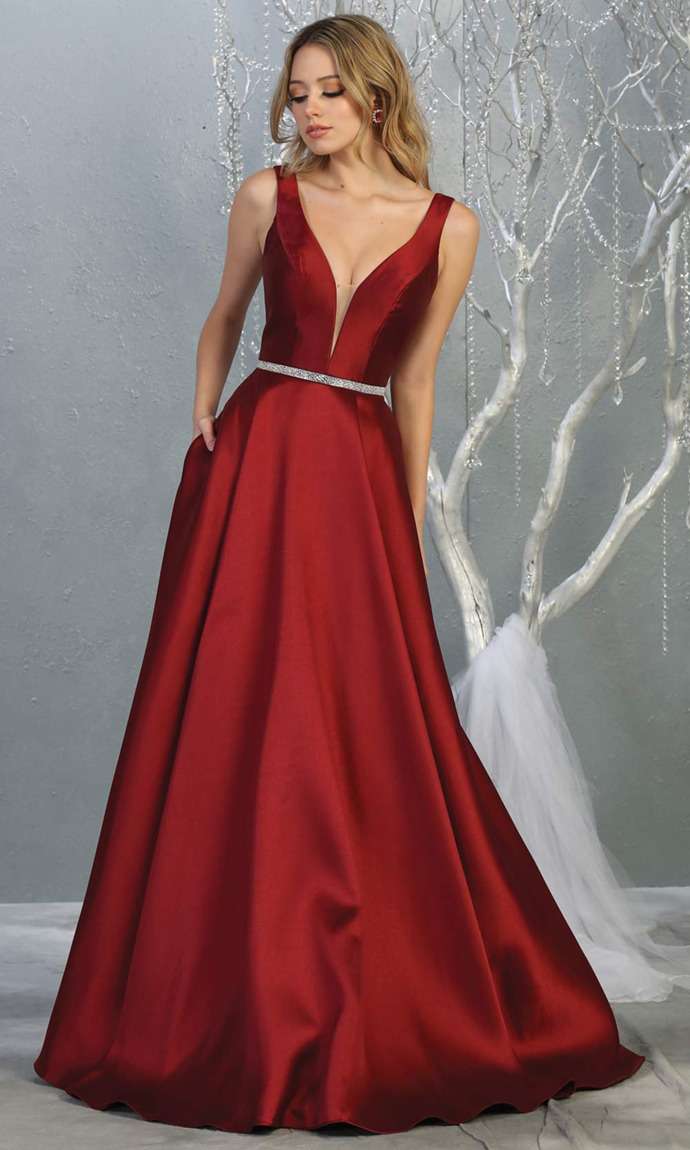 Mayqueen MQ1678 Long simple v neck burgundy red semi ballgown with pockets. This dark red flowy gown from mayqueen is perfect for prom, black tie event, engagement dress, formal party dress, plus size wedding guest dresses, bridesmaid, indowestern party dress